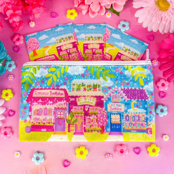 Bookshop Avenue bookmark pouch on a pink backdrop