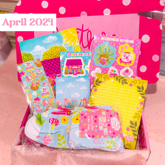 Colorful stationery set with a pink polka dot background and 'April 2024'