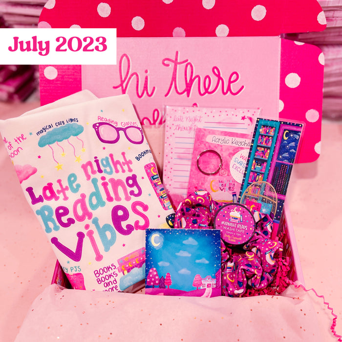 Colorful stationery set with a pink polka dot background and 'July 2023'
