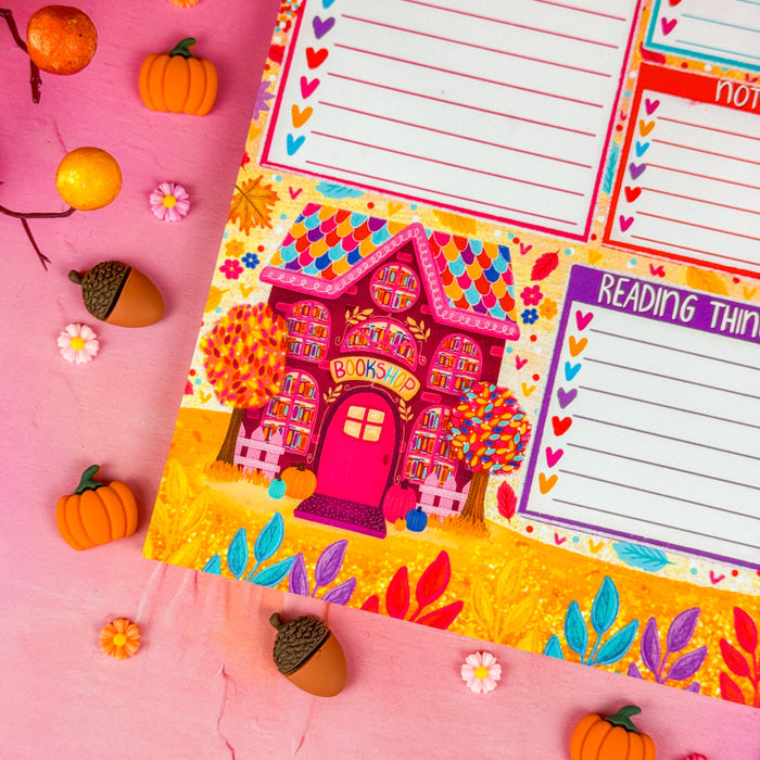 A notepad with sections for a to do list, important items, notes, and reading things. Featuring a fall bookshop in the lower left corner and leaves along the top.